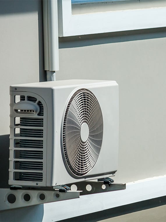Air conditioner unit outside in the Brisbane sun